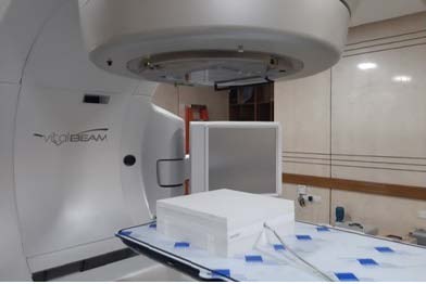 Figure 2: Solid water phantom setup with Farmer-type ionization chamber. c) The Linear Regression Linear regression is a very suitable tool for predictive analysis. It is generally used for forecasting an effect, forecasting a trend and determining the predictor's strength linearly. The formula defines the simplest form of the equation of linear regression y = bx + c............................... (4)
